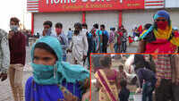 Pune: NGOs provide food to migrants waiting for buses to take them home 