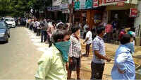 Telangana tipplers join liquor rush, but maintain discipline in serpentine queues 