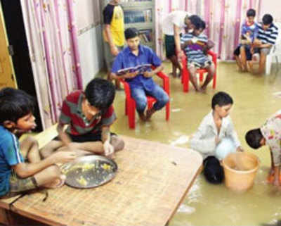 Children battle flood all night after rains submerge orphanage