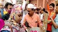 Muslims shower petals on Hindu devotees in Varanasi on Mahashivratri 