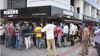 AP: Rush for liquor continues, crowding at several outlets 