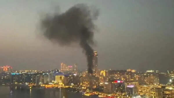 Debris from aerial interception strikes building in Dubai's Marina