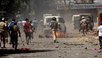 Surat: Agitated migrant workers clash with cops, pelt stones 