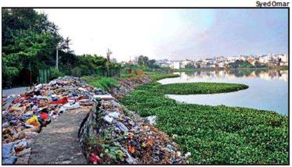 Damaged goods, hospital waste dumped at Shah Hatim Talab