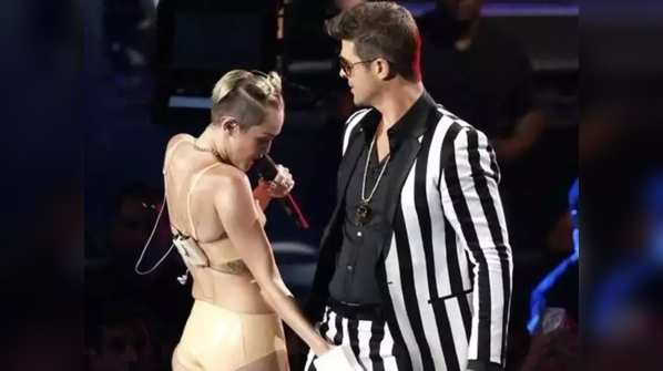 ​On-stage performance with Robin Thicke