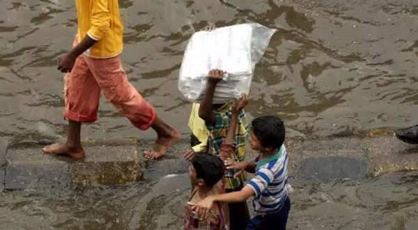 Diligent delivery boys waded flooded Mumbai streets to provide essential services