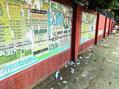 Beautified black spot defaced with posters, then fixed again