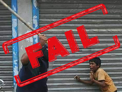 Fake alert: Photo showing cop wielding lathi at kid is from Bangladesh