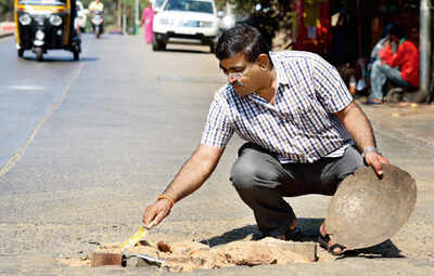 A dad fills up city’s potholes, to fix the hole in his heart