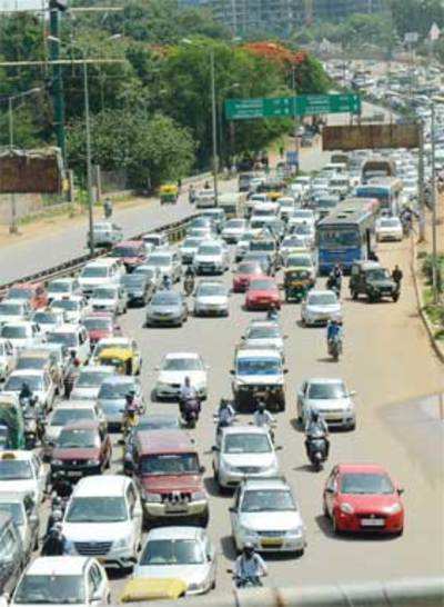 As the CM hits the road in city, commuters fume at gridlock
