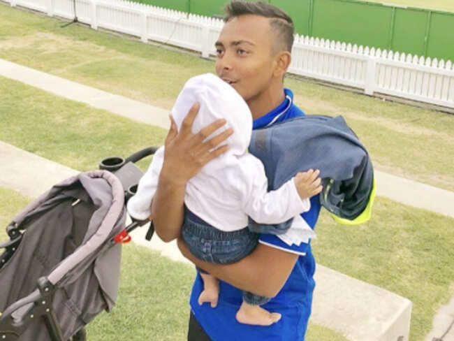 Holding a baby, Prithvi Shaw enjoys time off the field