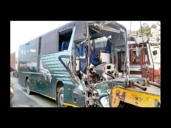 Bus hits truck; 2 killed