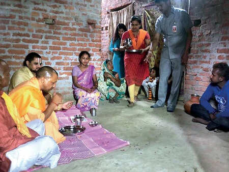 Amid  Election Commission ban, Yogi Adityanath meets triple talaq victim, Ram temple seer