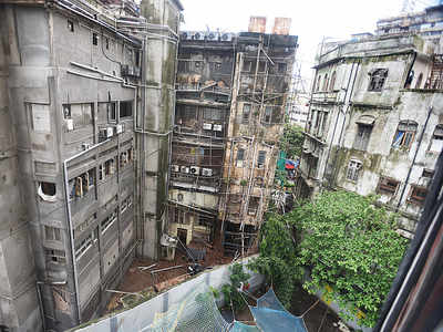 Parts of 71-year-old Nusser building behind the Royal Opera House collapses, BMC orders demolition