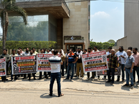 Residents protest delays, poor upkeep of society, demand transparency