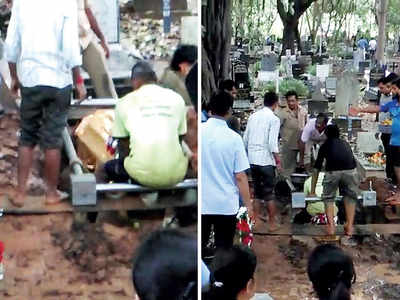 Mourners horrified as coffin comes floating out of grave