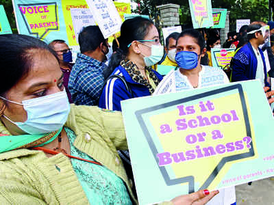 High fee: Parents hit the streets in protest