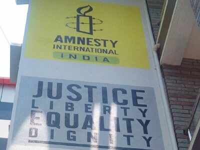 Amnesty India halts operations after govt freezes its bank accounts; accuses GoI of witch-hunt of human rights organisations