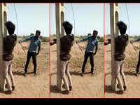 Black dude tied to pole