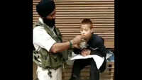 Watch: J&K policeman feeds a specially-abled boy 