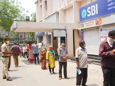 Telangana woman dies in queue at bank for government aid