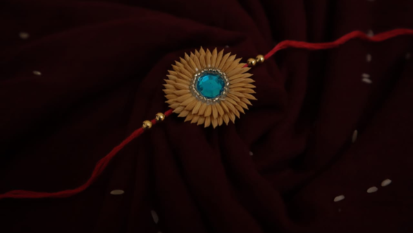Young artisan crafts eco-friendly Rakhis from paddy seeds, promoting sustainability