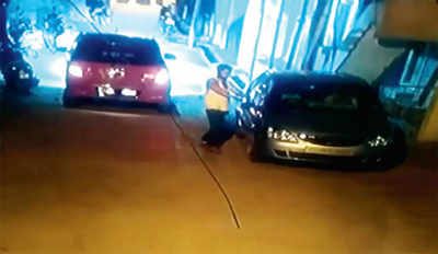 Man smashes car mirrors in act of vengeance