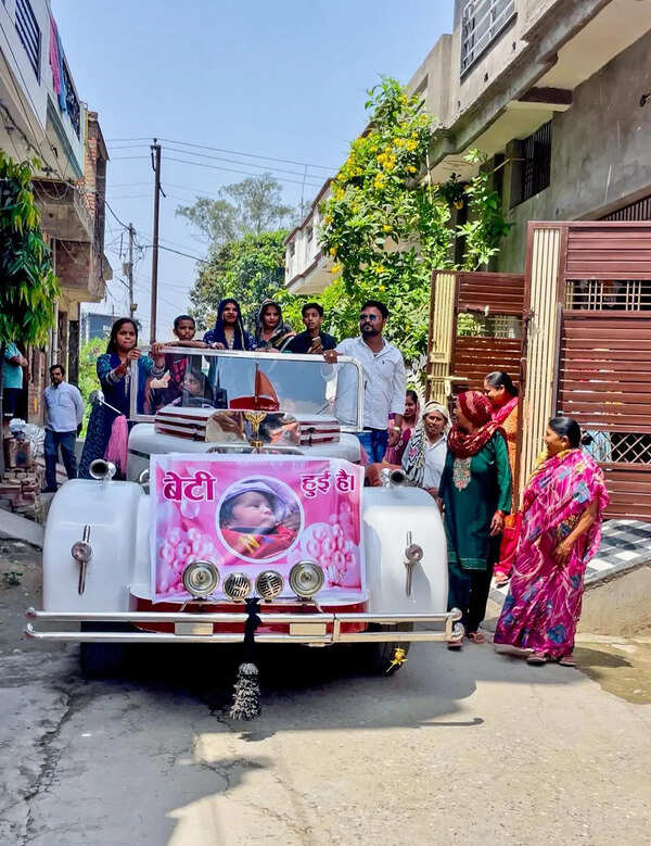 UP family celebrates birth of 2nd daughter with vintage car, drums, dancing