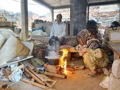 Family cooks with firewood after being denied LPG refill