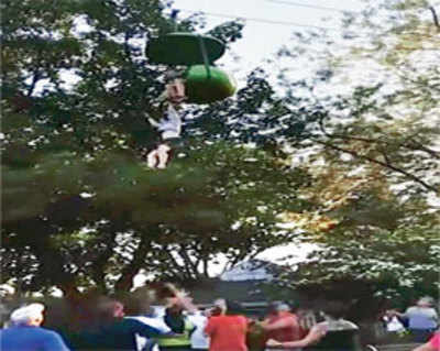 Crowd breaks teenager’s fall from park ride
