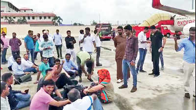 Karnataka: Air India flight diversion: Passengers protest