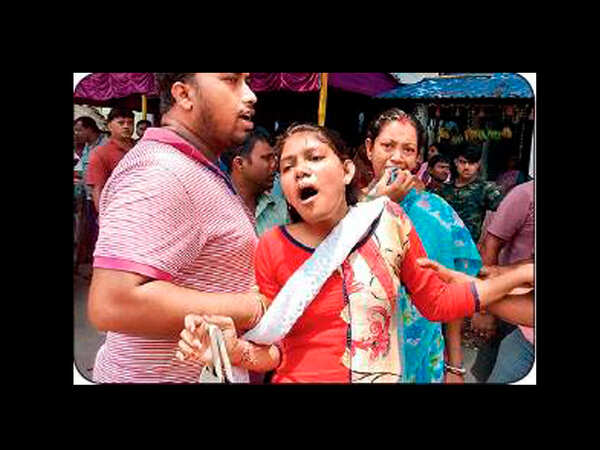Divided by poll politics, families united in death