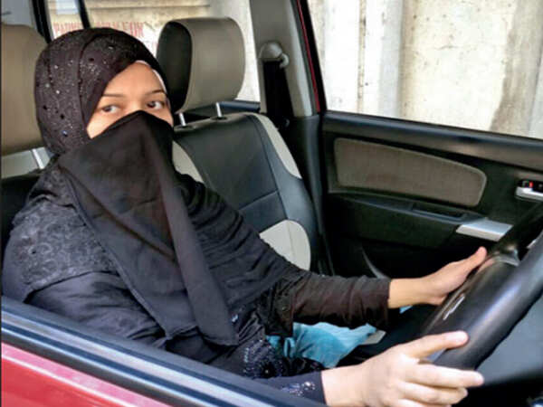 United colours of cabbies: Mom by day, burqa-clad driver by night