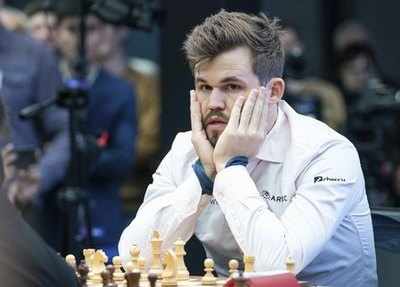Magnus Carlsen Invitational: Magnus Carlsen beats Fabiano Caruana 3-1, takes the lead