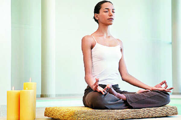Stay fit with candle-light yoga