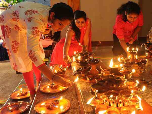 The tradition of lighting lamps at Diwali