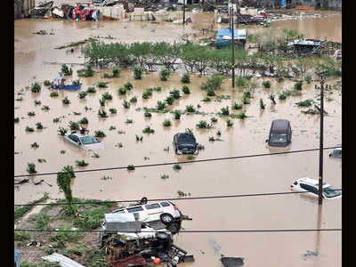 China typhoon moves north, toll rises to 32