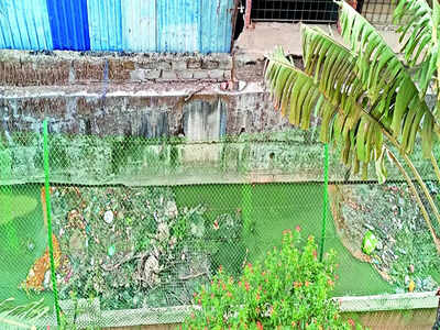 Garbage pile grows too close to stormwater drain