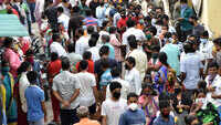 Bengaluru: Social distancing goes for a toss as people wait for free food pass 