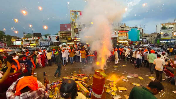 State BJP celebrates with ladoos and jhalmuri