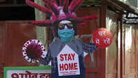 ‘Corona scarecrows’ alert people on Delhi roads 