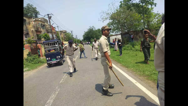 2 home guards hurt as squatters resist eviction drive near airport