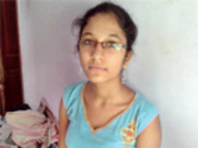 A girl who makes lamp wicks scores 98.5% in SSLC