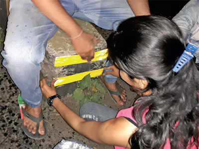 Mumbai youths apply radium stickers on dividers and speed breakers to help motorists at night