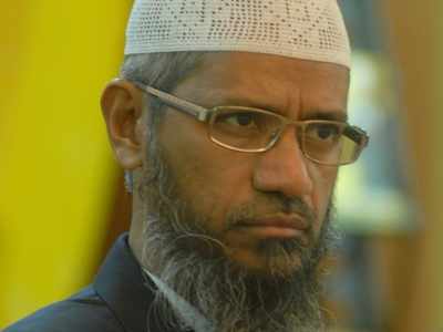 Controversial Islamic preacher Zakir Naik banned from making public speeches in Malaysia