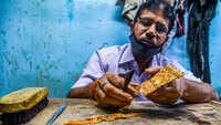 Karigars return to work in small jewellery stores as businesses slowly resume amidst the COVID-19 pandemic 