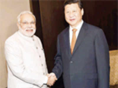 Modi meets China’s Xi, discusses border