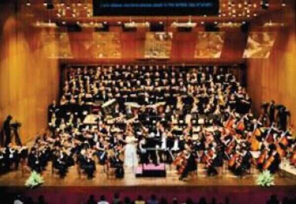 English chorus, city orchestra pick Haydn up from football field