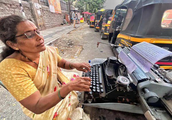 Lone typist outside Shivajinagar court waits for work