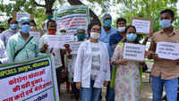 Employees of Bhilwara Ayush Staff Union stage protest outside BJP office in Jaipur 